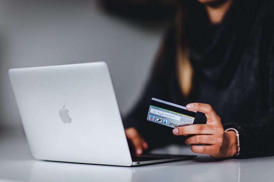woman shopping on laptop