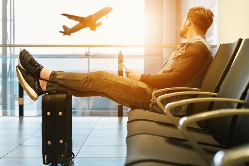 Man relaxing at the airport.