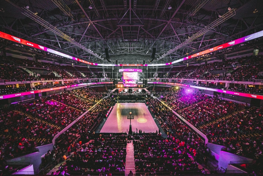 A packed basketball game event.